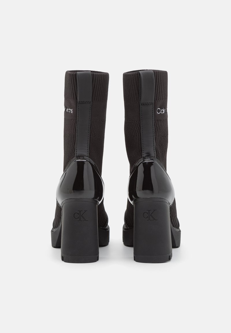 calvin klein jeans platform knit sock boots in black
