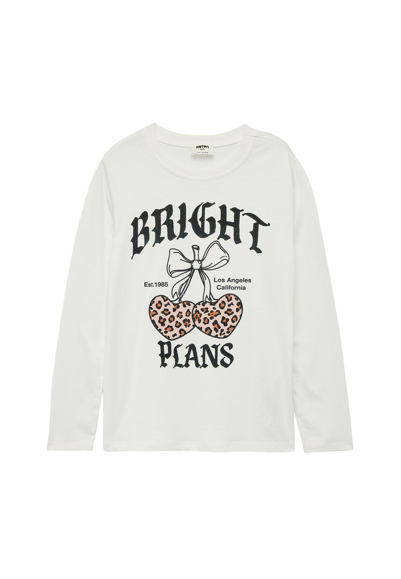 Hvid langærmet skjorte med sort tekst "BRIGHT PLANS" og et grafisk motiv af leopardprint-kirsebær med en sløjfe. Blødt bommaterials.