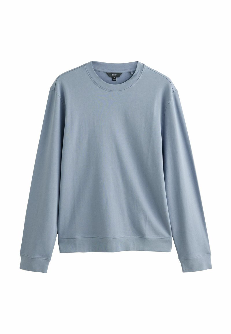 Sudadera de manga larga, azul claro, hecha de una tela suave. Presenta un escote redondo y puños acanalados con un diseño de ajuste relajado.