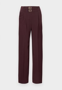 Παντελόνια σε σκούρο μπορντό με ψηλή μέση, δύο χρυσά λουριά με αγκράφες στην κορυφή και εφαρμογή με ίσια μπατζάκια.