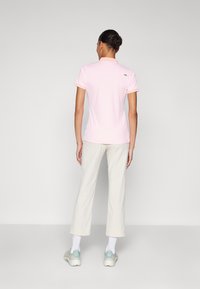 Kjus WOMEN COLLAGEN STRAIGHT PANTS - Calças - oyster