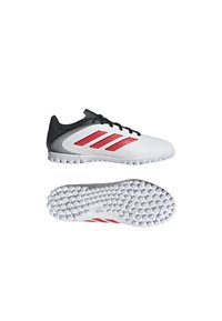 Zapatillas deportivas blancas con acentos negros, que presentan tres rayas rojas. Suela de goma con un patrón texturizado para mayor agarre. Diseño liviano.