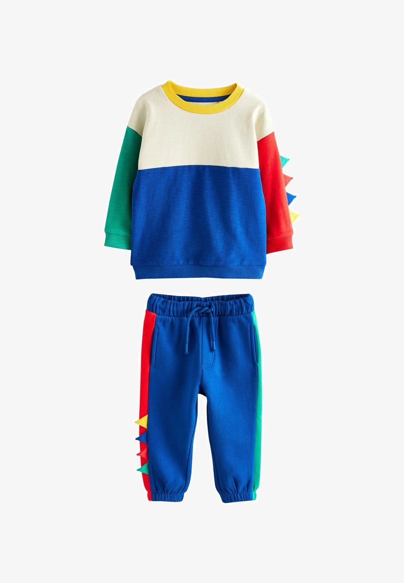 To-delt børnetøj bestående af en flerfarvet sweater med gule, grønne, røde og blå paneler samt blå sweatpants med sidelogo.