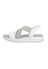 White sandals with a soft gray cross strap, a textured footbed, and a thick white sole featuring a subtle gray line.