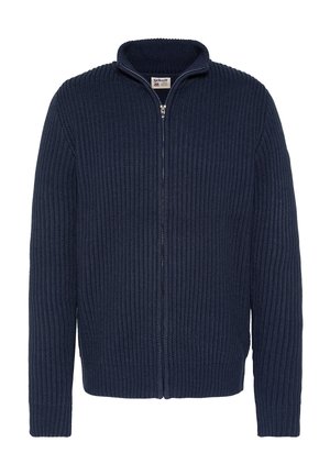 Cárdigan de punto azul marino con cremallera, que presenta una textura acanalada, cuello alto y mangas largas. Diseño sencillo con cierre de cremallera en la parte delantera.