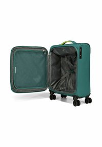 Valise rigide teal avec quatre roues pivotantes. L'intérieur ouvert présente un revêtement gris, une poche en filet et des sangles réglables pour sécuriser le contenu.