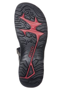 Suola di sandalo in gomma nera con design testurizzato, caratterizzata da un accento rosso prominente a forma di stella e branding "ecco". Taglia 44 indicata.