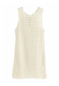 Top de ganchillo en color blanco roto con borde en forma de concha, que presenta un patrón de tejido abierto y un escote redondeado. Diseño ligero y sin mangas.
