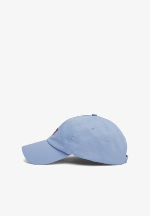 Light blue cotton cap with a curved brim, embroidered logo on the front, and adjustable strap at the back. Smooth texture, classic design.