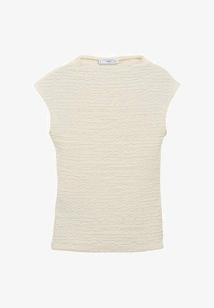 Cream-colored top with a textured, wavy pattern, and short sleeves. Round neckline, soft fabric, and slightly relaxed fit.