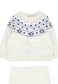 Cardigan a maglia crema e gonna coordinata, con un motivo a fiocco di neve in blu scuro e blu chiaro. Bottoni sul cardigan e orlo a costine.