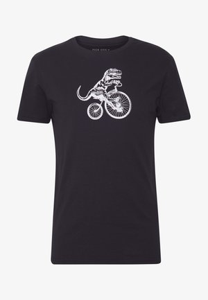 Czarna koszulka z krótkim rękawem z białym nadrukiem T-Rexa jadącego na rowerze retro, umieszczonym na środku klatki piersiowej.