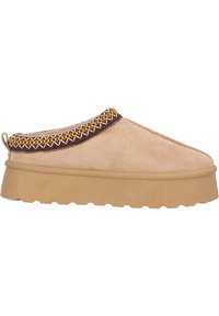 Beige slip-on sko med en tekstureret overdel, brun kant og gule broderede detaljer, der har en tyk sål og en rund tådesign.