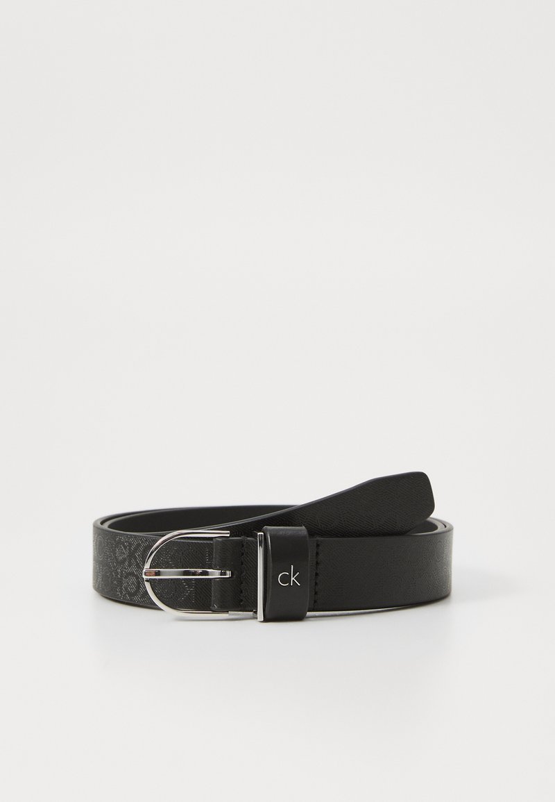 Black leather belt with silver metal buckle, featuring a smooth finish and embossed pattern on part of the strap. Brand logo on buckle.