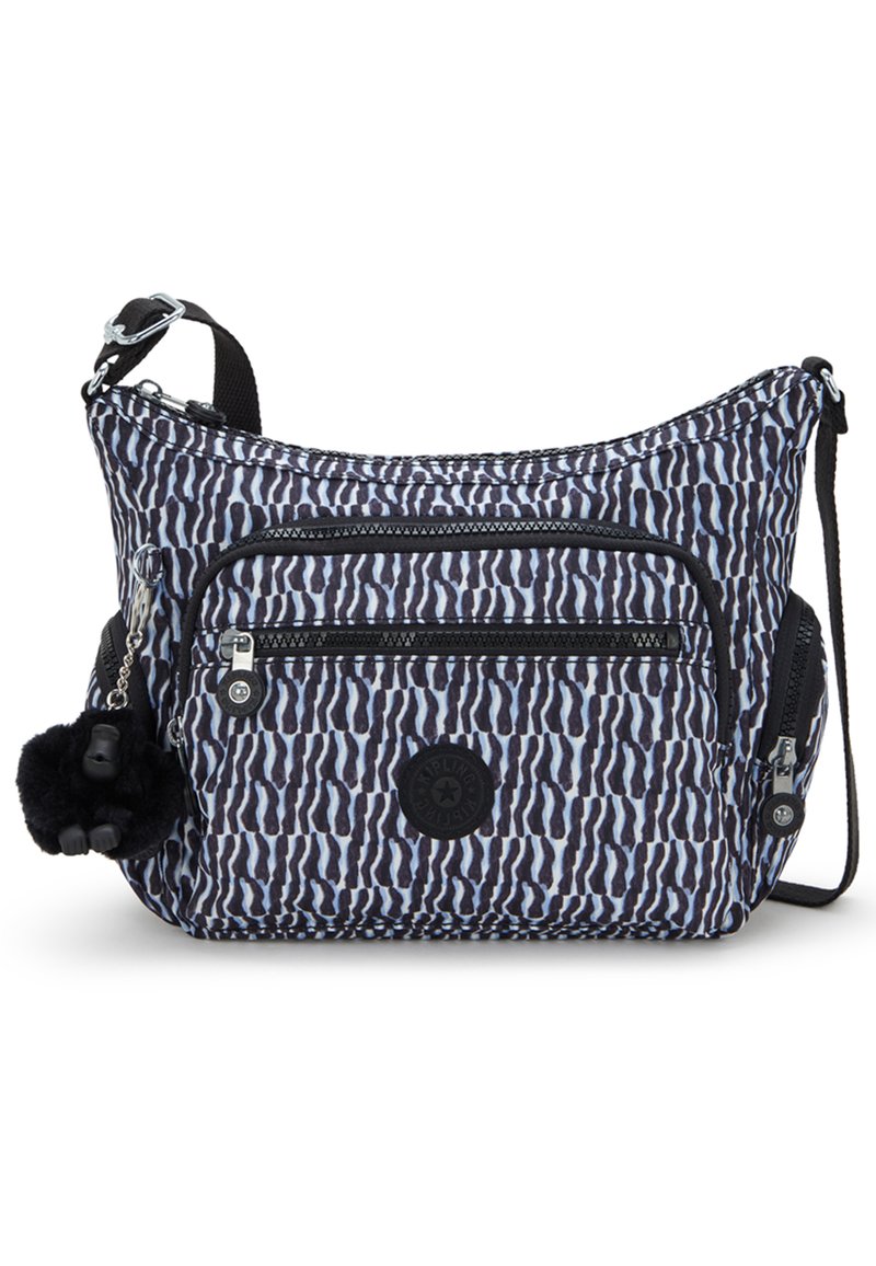 Zebramönstrad axelväska i blå och svart tyg, med flera dragkedjefickor och en pom-pom-accessoar. Texturerad yta.