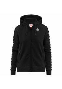 Felpa nera con zip, realizzata in tessuto morbido e dotata di cappuccio regolabile con cordino. Presenta il logo Kappa bianco e una rifinitura decorata lungo le maniche.