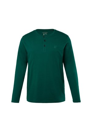 Maglietta henley a maniche lunghe di colore verde scuro realizzata in cotone, con una patta di bottoni e un logo discreto sul petto.