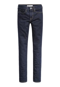 Jeans skinny de color azul oscuro, fabricados en denim, con costuras amarillas, cinco bolsillos y una cremallera con cierre de botón.