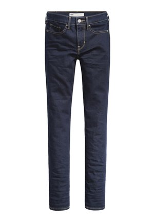 Dunkelblaue Skinny-Jeans aus Denim, mit gelben Nähten, fünf Taschen und einem Reißverschluss mit Druckknopfverschluss.