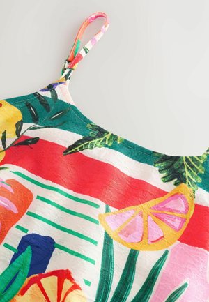 Top colorato senza maniche con una vivace stampa di frutta e fiori su uno sfondo testurizzato nei toni del verde, rosa, arancione e bianco.