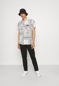 Replay Chinos - black