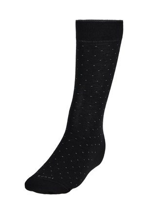 Black cotton socks featuring a fine dotted pattern, reinforced toe, and ribbed cuff. Soft texture with a classic mid-calf height.