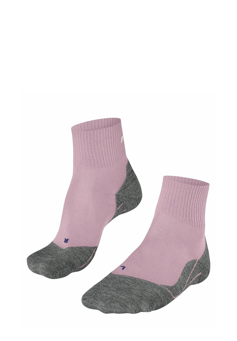 Calzini sportivi rosa chiaro con caviglia a coste, sezione del tallone e delle dita grigia e cuciture a contrasto. Materiale in misto poliestere.