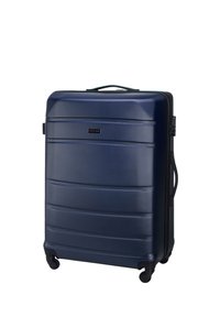 Navyblauer Hartschalenkoffer mit strukturierter Oberfläche, drei horizontalen Rillen, ausziehbarem Griff und vier Rollen für Mobilität.