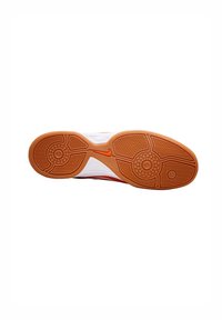Semelle de chaussure arborant un design en caoutchouc texturé, principalement beige avec des accents orange. Des motifs circulaires et un logo Nike sont visibles.