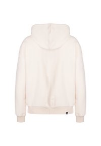 Felpa leggera beige realizzata in materiale morbido e testurizzato. Presenta un cappuccio, polsini e orlo a coste, con una piccola etichetta con logo in basso a sinistra.