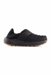 Scarpe nere slip-on con tomaia trapuntata, tessuto testurizzato e suola in gomma. Presenta un dettaglio del logo e una suola esterna robusta per una buona aderenza.