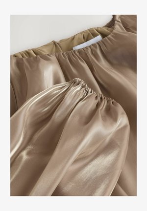 Next Pusero - champagne gold