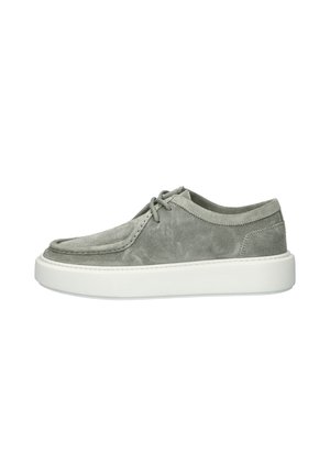 Grijze suède schoenen met een afgeronde neus, minimalistisch ontwerp en een witte rubberen zool. Voorzien van veters en een laag profiel.