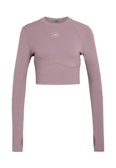 Mauve long-sleeve crop top with round neckline, thumb holes, and small white circular logo at center chest.