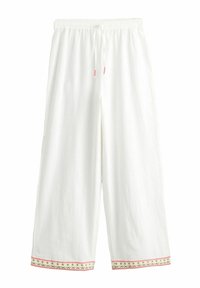 Valkoiset leveälahkeiset housut, joissa on elastinen vyötärönauha ja nyöri, koristeltu vaaleanpunaisella ja vihreällä kirjotulla reunuksella lahkeiden helmassa.