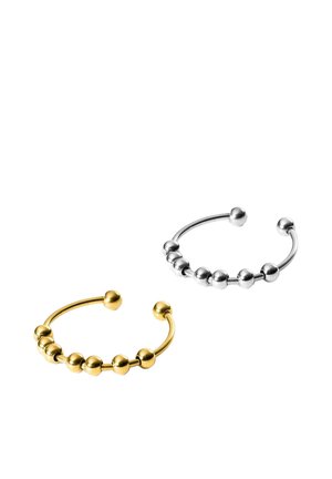 Zwei offene Perlenringe, einer goldfarben und einer silberfarben, jeweils mit sieben gleichmäßig verteilten kugelförmigen Perlen auf einem dünnen Band.