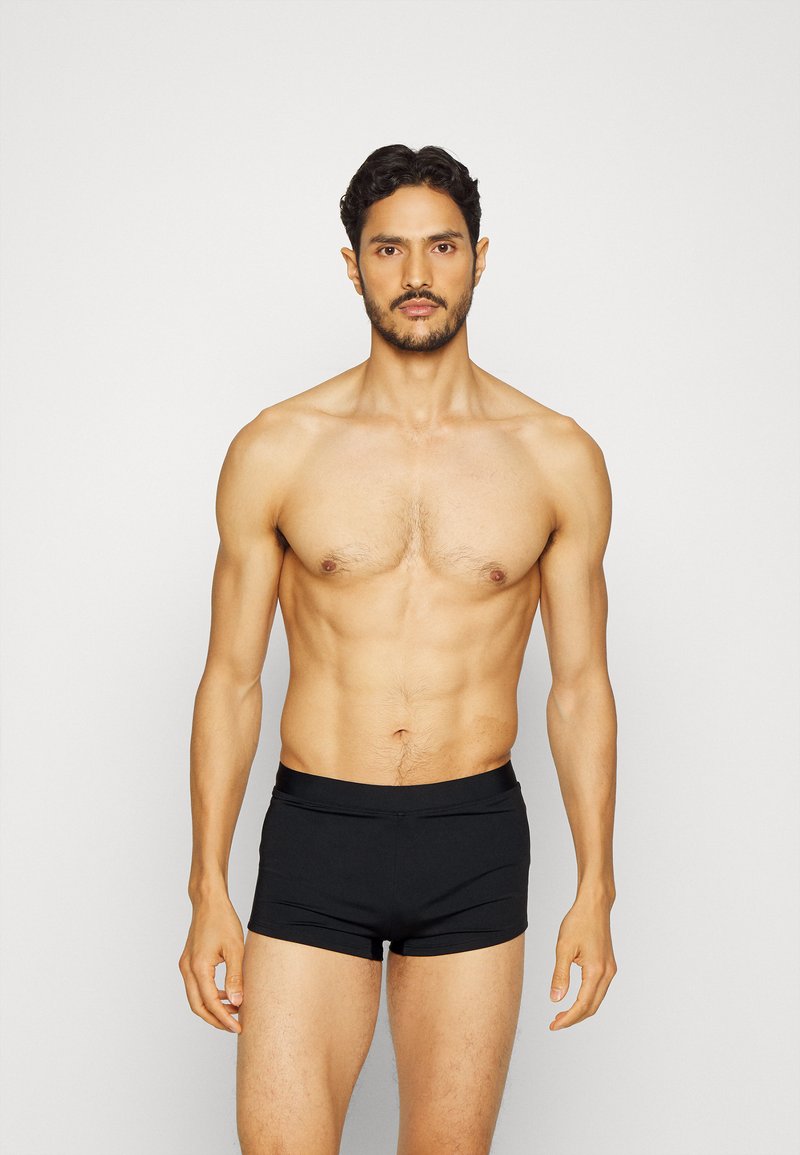 Calvin Klein Swimwear TRUNK Șorturi de baie black/negru Zalando.ro