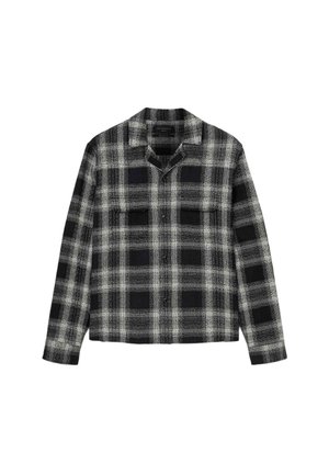 Sort og hvidt ternet flannel skjorte med krave, lange ærmer, to brystlommer og en afslappet pasform. Blød tekstur med et vævet mønster.