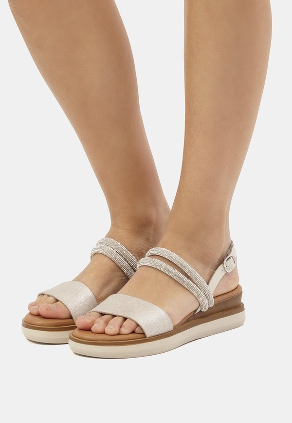 DANIELA - Keilsandalette - metal plata