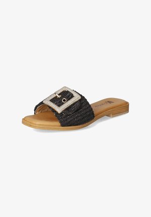 Black woven slide sandal with a sparkly rectangular buckle detail, tan footbed, and flat sole. Rubber outsole for grip and comfort.