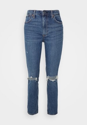 Niebieskie jeansy z denimu o prostym kroju, z przetartymi rozdarciami na obu kolanach i stylem z pięcioma kieszeniami oraz zapięciem na guzik i zamek błyskawiczny.