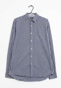 Camisa de manga larga a rayas azul y blanca con cuello abotonado, bolsillo frontal y dobladillo redondeado. La tela parece ligera y texturizada.