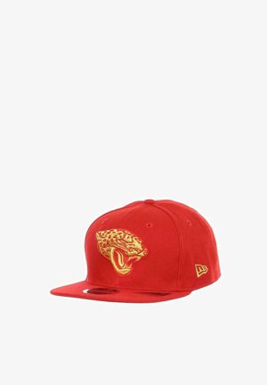 Red flat-brim cap featuring a gold embroidered roaring jaguar head on front and a small gold logo on the side.