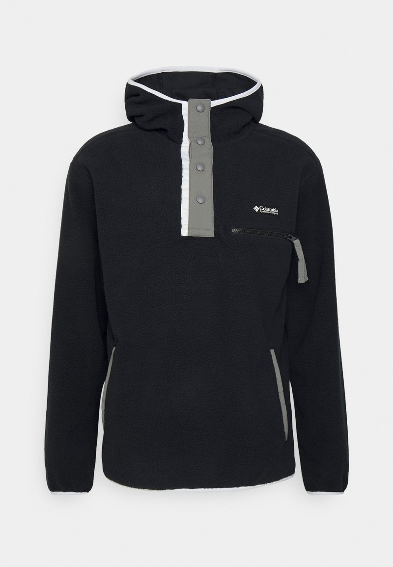 Sweat à capuche en polaire noire avec patte de boutonnage grise, poche zippée sur la poitrine, poches latérales et logo Columbia Sportswear sur le côté droit avant.