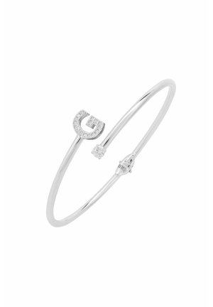 Silver open bangle bracelet with pavé-studded "G" on one end and a small round clear gem on the other end.