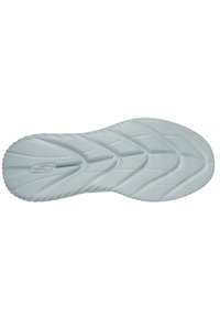 Semelle de basket en gris clair avec un motif texturé en zigzag. Présente de petites grips circulaires et un logo proéminent au centre.