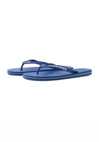Blauwe flip-flops met textured zolen en dunne bandjes. Heeft een contrasterende oranje accenta op de zool en een logo op het bandje.