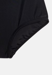 Zwarte zwemonderbroek van gladde, rekbare stof. Heeft een hoge beenopening en vlakke naden voor comfort. Minimalistisch design zonder zichtbare patronen.