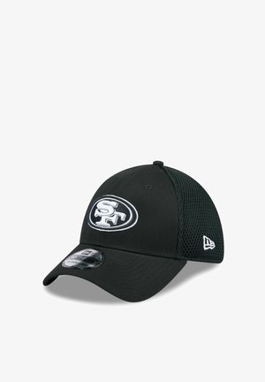 Black baseball cap with white "SF" logo on front, mesh back panels, and a curved brim with a size sticker.