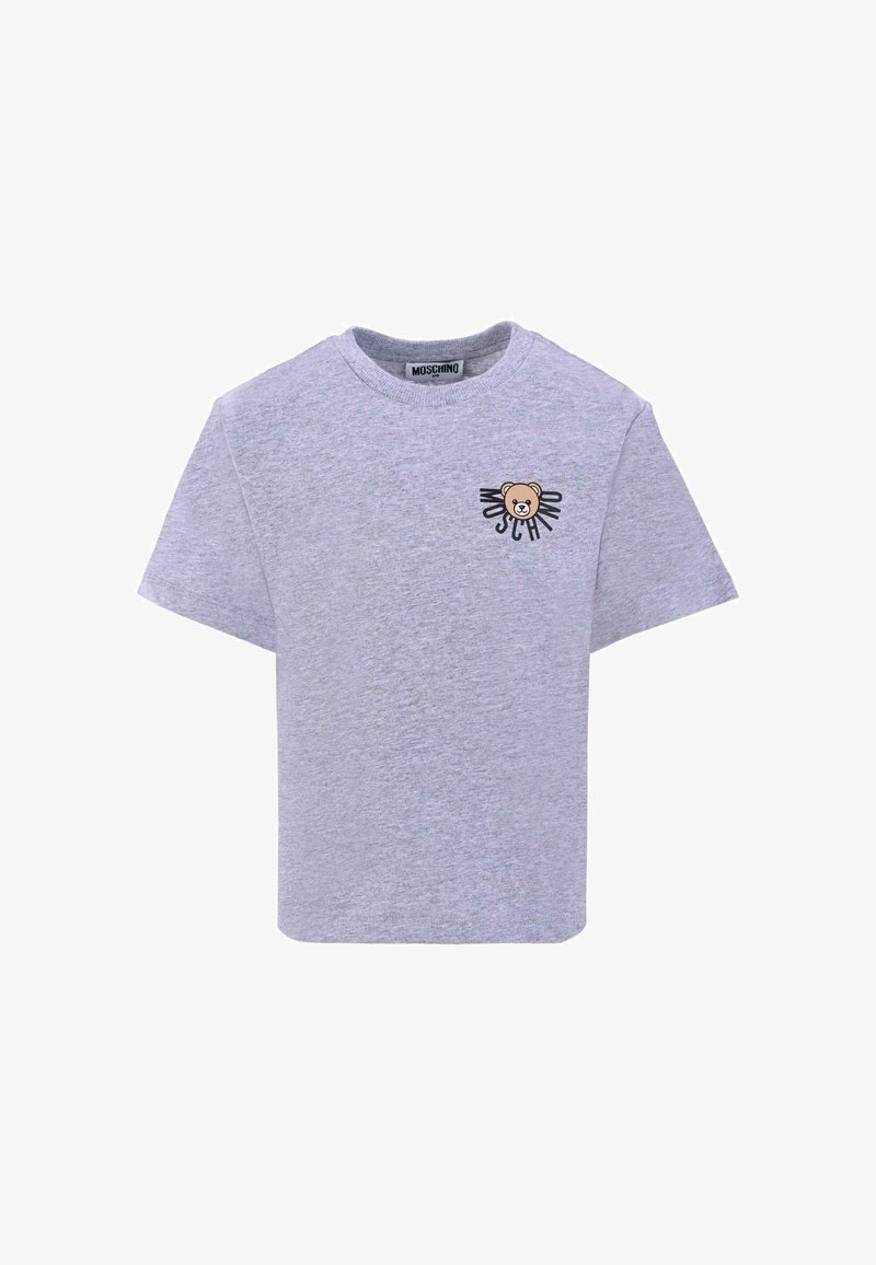 T-shirt gris à manches courtes en coton avec un col rond. Présente un design d'ours sur la poitrine gauche et le nom de la marque "Moschino."